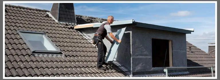 Armour Roofing crew re-roofing a home in the Georgian Triangle